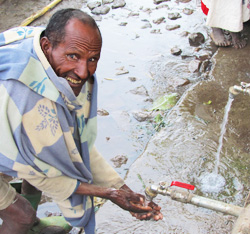 man handwashing