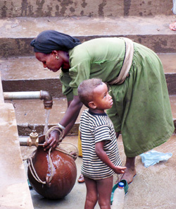 child with water container
