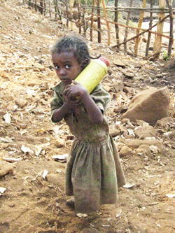 child with water container